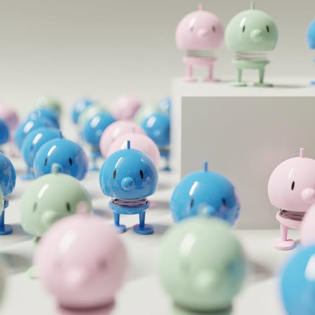 Farverige 3D-figurer i et produktstudie